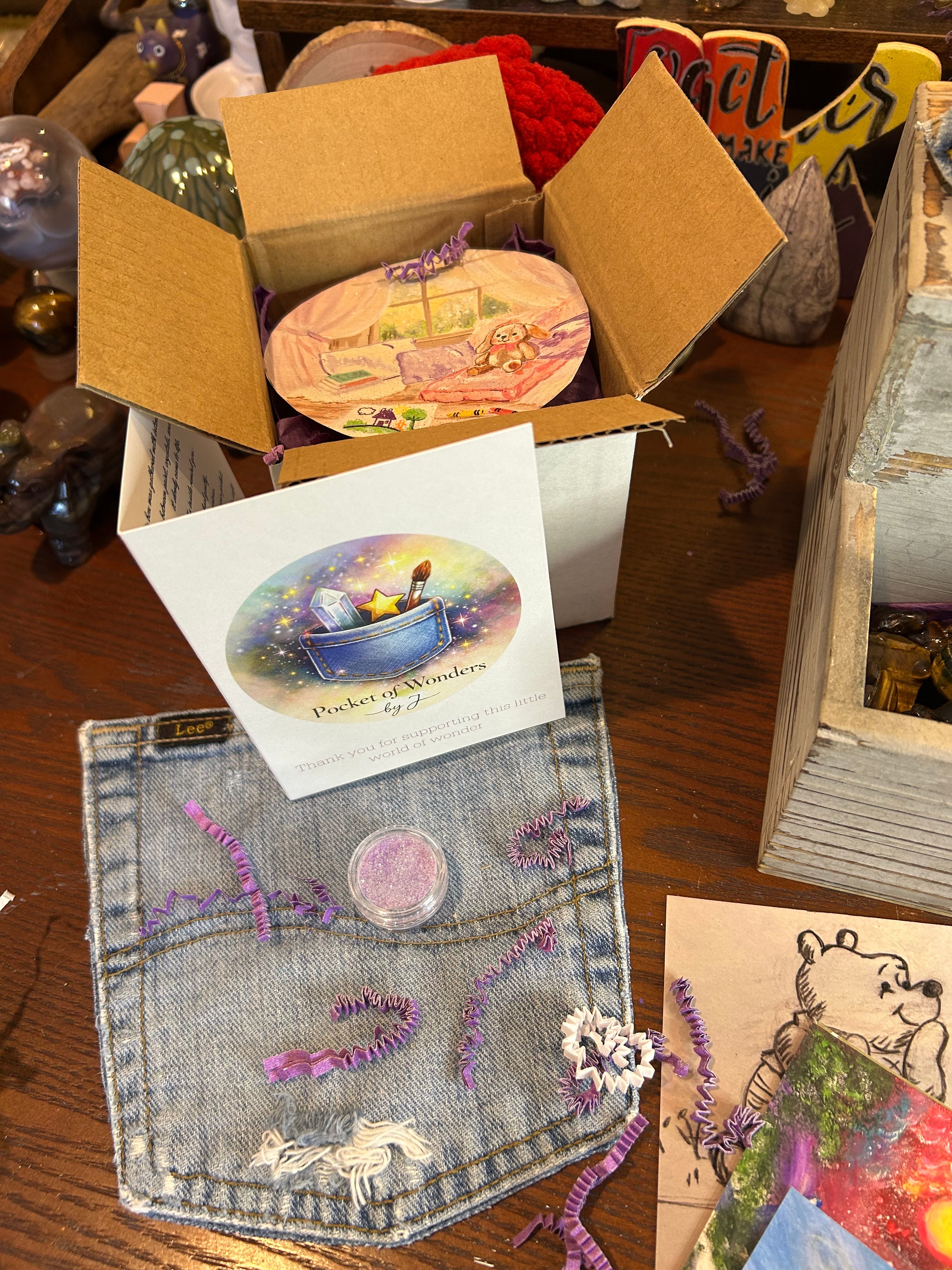 A personal, curated box with crystals, affirmation cards, original art work and a little bit of magic